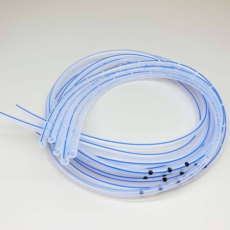 Bi-colour silicone tubing with dual colour identification stripes
