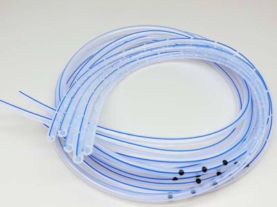 Bi-colour silicone tubing with dual colour identification stripes